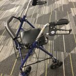 Walker with seat pictured in the library